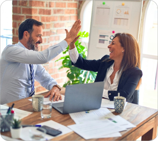 Colleagues high-fiving